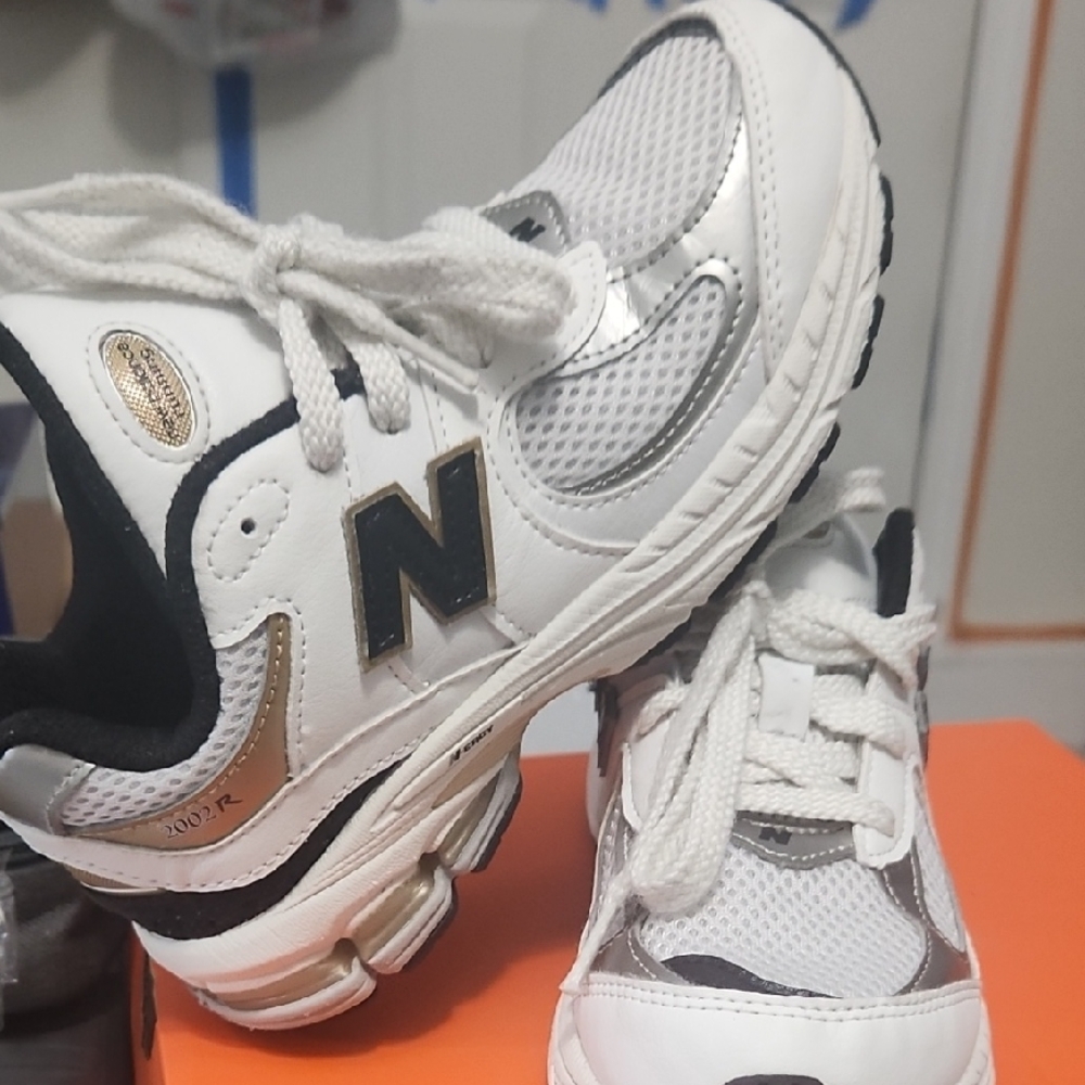 New Balance Kids White and Silver Sneakers